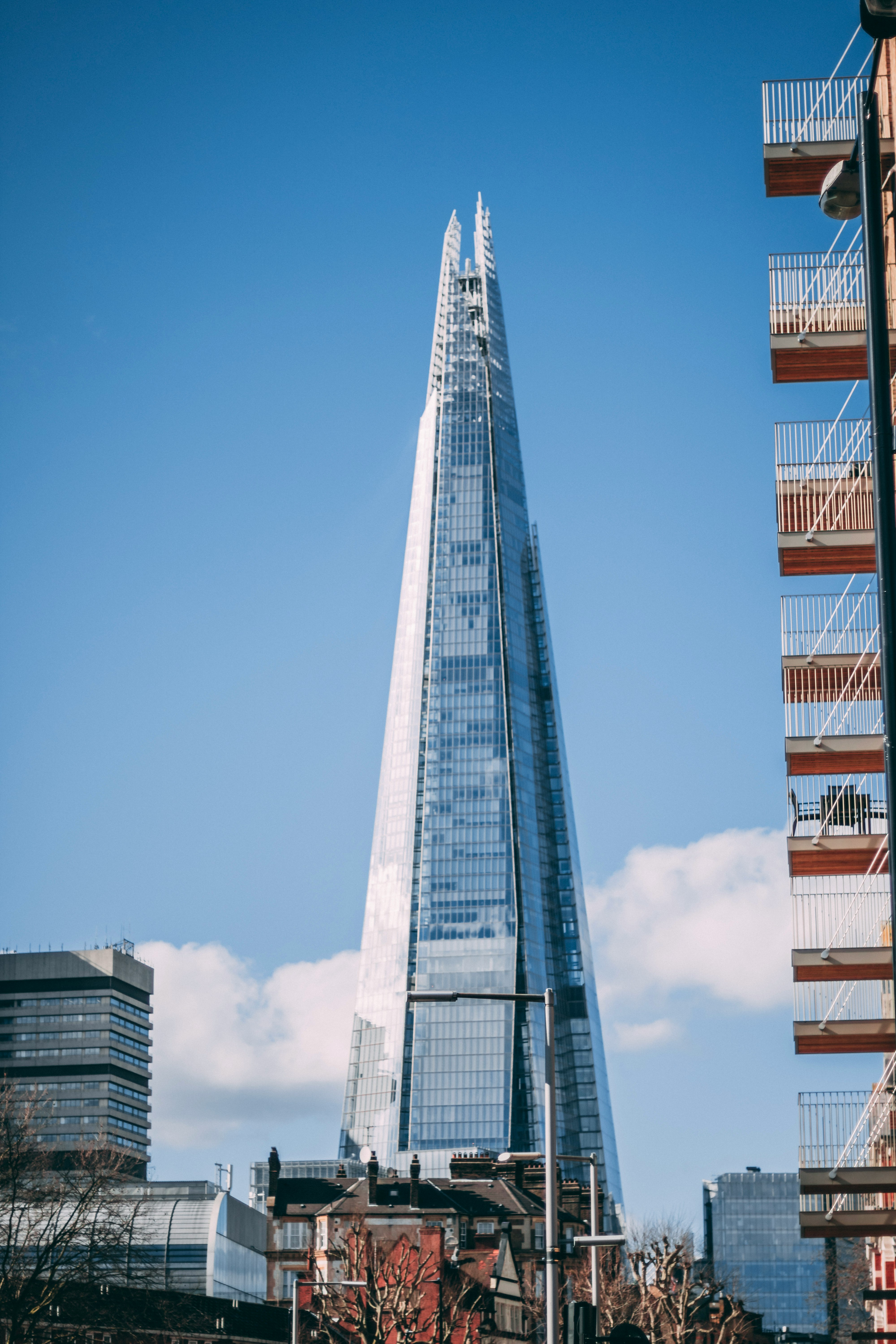 gray and brown concrete building under blue sky during daytime